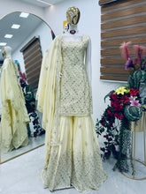 Ravishing Yellow Natural Crap Embroidery Sequence Palazzo Suit
